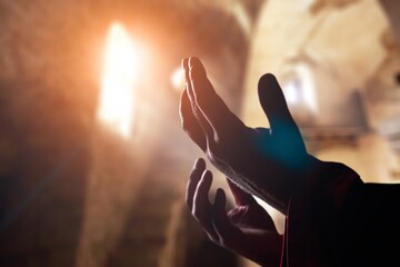 Poster - Hand of  muslim praying person with mosque interior