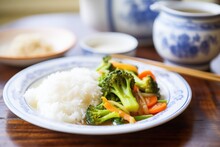 Plate Of Steamed Vegetable Medley With Rice On The Side