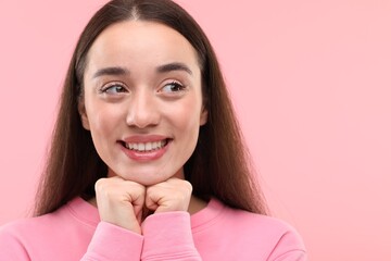 Wall Mural - Beautiful woman with clean teeth smiling on pink background, space for text