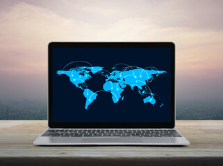 Wall Mural - Connection line with global world map on laptop computer screen on table over city at sunset sky, vintage style, Business communication online concept, Elements of this image furnished by NASA