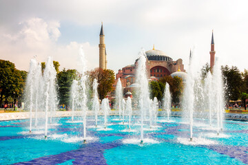 Wall Mural - istanbul, turkey - 18 aug, 2015: hagia sophia mosque behind the fountain in the sultan ahmet park