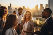 © AspctStyle - Diverse Group of Young Professionals Enjoying a Casual Rooftop Party at Sunset, Urban Socializing Concept
