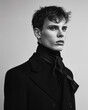 © ADDICTIVE STOCK - Monochrome portrait of a young model in stylish attire. Generative AI image