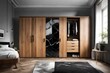 a wooden wardrobe with black marble doors into a Scandinavian-style interior design for a modern bedroom can create a sleek and stylish look.   