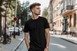 © Anastasiia - Street Mockup Featuring Man Wearing Black T-Shirt