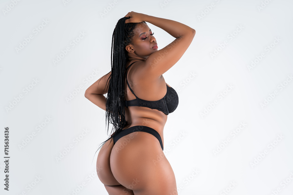 Plus size model in lingerie, fat sexy curvy African black woman in underwear  on gray background, overweight thigh, hips and buttocks, obesity female  body with cellulite, fat body Stock-foto | Adobe Stock