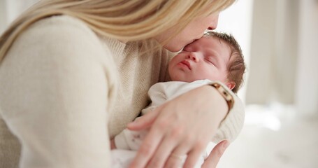 Family, kiss and a mama rocking her baby to sleep in the bedroom of their home together for love or care. Dreaming, nap or tired with a parent and newborn infant in an apartment to rest for growth