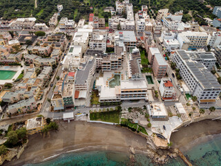 Aerial top view by drone of a small tourist town.