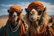 Amidst the vast desert, two majestic arabian camels adorned in traditional orange head wraps and necklaces stand tall, embodying the resilience and grace of these iconic mammal creatures