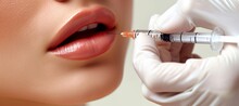 Aesthetic Medicine Procedure  Doctor Performing Local Injection On Woman S Lips With Copy Space
