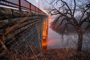 Wall Mural - Old stone arch bridge across the Mississippi river 