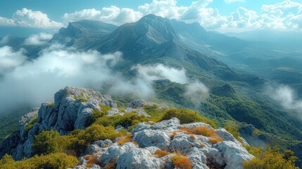 Sticker -  the view from the top of a mountain looking down at a valley with a mountain range in the distance with low lying clouds and trees on the top of the mountain.