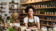 © VERTEX SPACE - Eco-friendly containers for storing green consumer shop net zero waste store african seller retail home office shop. Small SME owner young adult woman Gen Z people happy smile pride look at camera