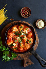 Wall Mural - Meatballs with rice in tomato sauce. Top view with copy space.