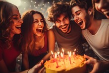A Group Of Friends Playing Party Games, Laughter Filling The Air As They Celebrate A Birthday Together.