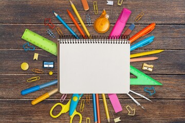 Wall Mural - Notebook, pen, colored pencil on light background