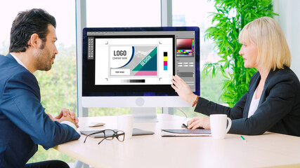 Graphic designer software for modern design of web page and commercial ads showing on the computer screen