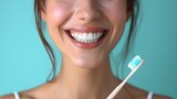 Fototapeta Sypialnia - person brushing teeth, a woman with a smile on her face and a toothbrush in her mouth and a toothbrush in her mouth