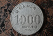 Münze zu Tausend indonesischen Rupien