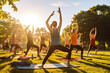 © Henry Saint John - Outdoor Yoga Class in Park.