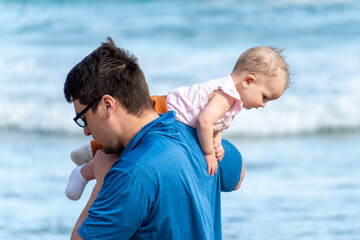 a baby in a carrier