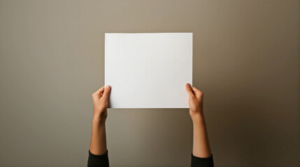 person holding a blank sign for mockup or display purposes
