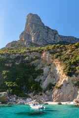 Wall Mural - Cliffed coastline near Santa Maria Navarrese with Punta Giradili in the background in east Sardinia