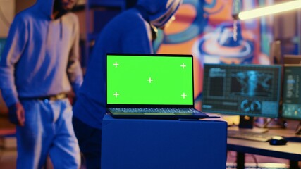 Poster - Isolated screen laptop used by cybercriminals in abandoned warehouse to write lines of code, developing malware that get past security systems. Mockup device used by rogue programmers in secret bunker