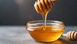 Golden honey drips from a dipper, symbolizing health and sweetness, a tempting visual of natural goodness