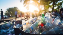 Closeup Of An Overflowing Trash Bin Filled With Empty Water Bottles, Representing The Importance Of Sustainability And Staying Hydrated At A Festival.