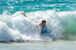 © Allison - boogie boarding and playing in the water at Poipu beach