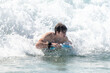 © Allison - boogie boarding and playing in the water at Poipu beach