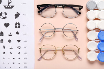 Sticker - Stylish eyeglasses with eye test chart and containers for contact lenses on beige background