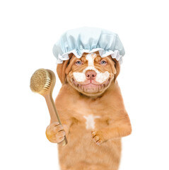Leinwandbilder - Smiling Mastiff puppy wearing shower cap with cream on it face holds shower brush. isolated on white background