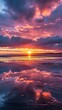 © NabilBin - A stunning image of a vibrant sunset with clouds reflected on the wet sand during low tide