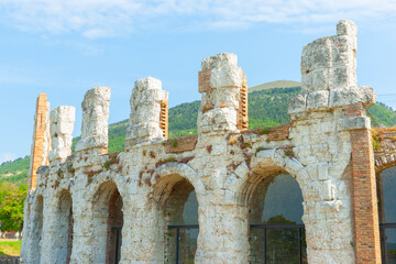 Sticker - Section of amphitheater are the ruins of a 1st-century ancient Roman theatre in Gubbio, Umbria in Italy.