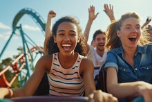 Excited, happy young people group of friends riding a roller coaster at amusement park