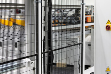 Poster - industrial automatic equipment with safety fence