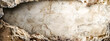 © edojob - A panoramic view of a spacious cave interior with a rough, textured wall showcasing natural earth tones and subtle stone formations