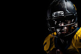 Fototapeta  - Intense American Football Player in Helmet on Dark Background
