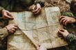 paper map held open by their hands