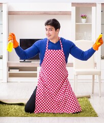 Wall Mural - Contractor man cleaning house doing chores