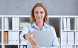 © H_Ko - Businesswoman offer hand to shake as hello in office closeup. Serious business friendly support service excellent prospect introduction or thanks gesture gratitude invite to participate concept