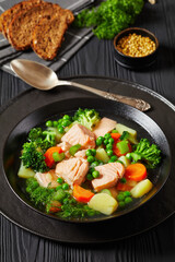 Poster - salmon, veggies and green herbs soup in bowl