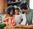 © Lumos sp - child family kitchen food boy son father mother watermelon fruit slice summer organic meal fun preparing healthy diet eating home black