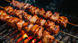 Pork on skewers cooked on barbecue grill