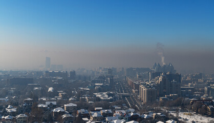 Wall Mural - Strong smog over the Kazakh city of Almaty on a winter day