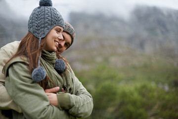 Poster - Couple, hug and smile on hiking vacation in outdoors, love and bonding in relationship for connection. People, embrace and travel for exploring adventure, romance and security in marriage on mountain