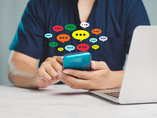Wall Mural - man using a smartphone with social media icons.