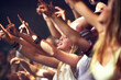 Night, concert and fans dance to music, performance and audience with energy at festival. Crowd, support and people stretching hands in celebration or praise of rock, culture or excited at event
